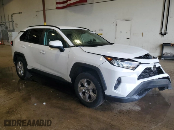 2020 Toyota RAV4 XLE with VIN 2T3W1RFV5LW065988, listed as a Copart auction lot 57382295 with 91,364 mi miles and Clean title. Bid and sale history available at DreamBid. Image 4.