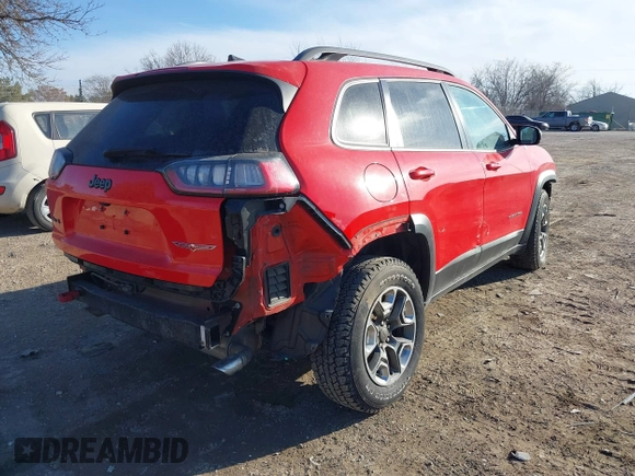 2019 Jeep Cherokee Trailhawk Elite with VIN 1C4PJMBX3KD217437, listed as a IAAI auction lot 41448614 with 85,889 mi miles. Bid and sale history available at carsss.com. Image 4.