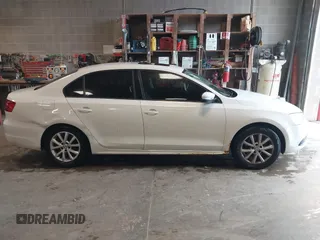 2011 Volkswagen Jetta SE with VIN 3VWDX7AJXBM315916, listed as a IAAI auction lot 42311284 with 207,297 mi miles and . Bid and sale history available at DreamBid. Image 13.