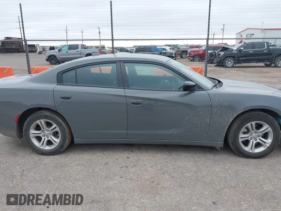 2023 Dodge Charger SXT z VIN 2C3CDXBG4PH663294, wystawiony jako IAAI lot #42376163 z przebiegiem 42 656 mil mil oraz . Historia ofert i sprzedaży dostępna na DreamBid. Obrazek 14.