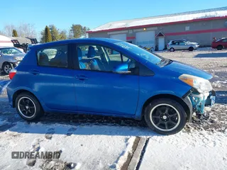 2012 Toyota Yaris L with VIN JTDKTUD31CD504632, listed as a IAAI auction lot 41660676 with 105,789 mi miles. Bid and sale history available at carsss.com. Image 15.