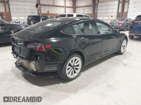 2023 Tesla Model 3 with VIN 5YJ3E1EA5PF552241, listed as a IAAI auction lot 41876487 with 18,533 mi miles and . Bid and sale history available at carsss.com. Image 4.