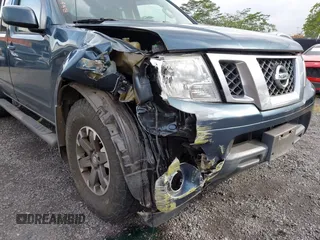 2014 Nissan Frontier SV with VIN 1N6AD0EV1EN755257, listed as a IAAI auction lot 42269702 with 62,451 mi miles and . Bid and sale history available at DreamBid. Image 6.