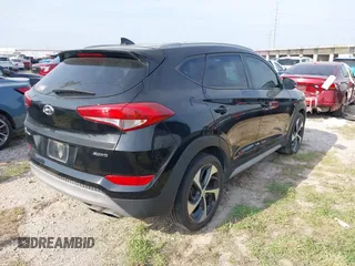 2018 Hyundai Tucson Sport z VIN KM8J33AL5JU741563, wystawiony jako IAAI lot #41928357 z przebiegiem 97 004 mil mil oraz . Historia ofert i sprzedaży dostępna na DreamBid. Obrazek 4.
