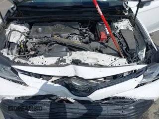 2019 Toyota Camry LE z VIN 4T1B11HKXKU237605, wystawiony jako IAAI lot #42248386 z przebiegiem 70 235 mil mil oraz . Historia ofert i sprzedaży dostępna na DreamBid. Obrazek 10.