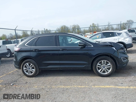2015 Ford Edge SEL with VIN 2FMTK4J88FBB05259, listed as a IAAI auction lot 42043247 with 128,987 mi miles. Bid and sale history available at carsss.com. Image 13.