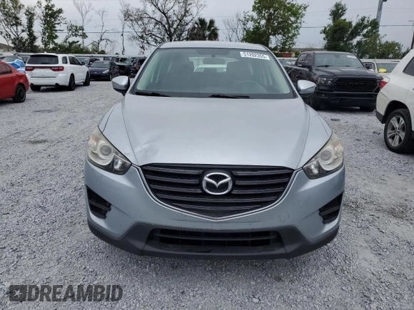 2016 Mazda CX-5 Sport with VIN JM3KE4BY1G0799275, listed as a Copart auction lot 51202355 with 98,409 mi miles and Non Repairable. Bid and sale history available at carsss.com. Image 5.