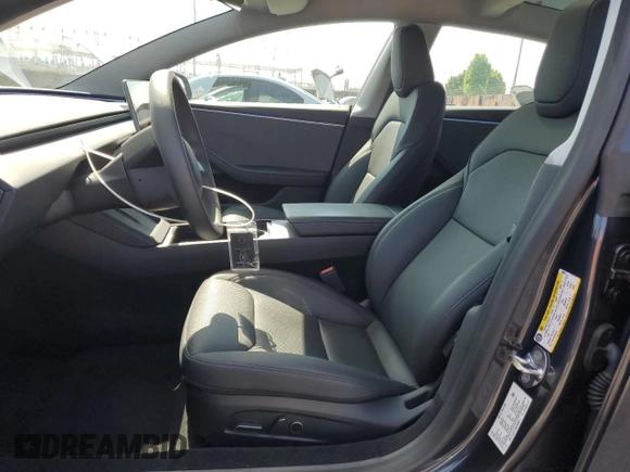 2025 Tesla Model 3 Long Range with VIN 5YJ3E1EA6SF908074, listed as a Copart auction lot 54786175 with 3,998 mi miles and Salvage title. Bid and sale history available at DreamBid. Image 7.