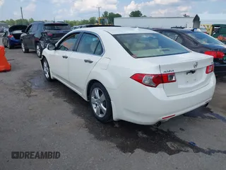 2009 Acura TSX with VIN JH4CU26609C014399, listed as a IAAI auction lot 42619619 with 153,543 mi miles and . Bid and sale history available at DreamBid. Image 3.