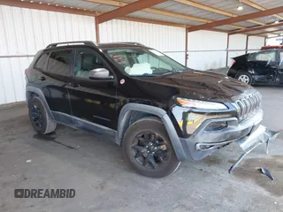 2015 Jeep Cherokee Trailhawk with VIN 1C4PJMBB6FW576120, listed as a IAAI auction lot 42485631 with 149,974 mi miles and . Bid and sale history available at DreamBid. Image 1.