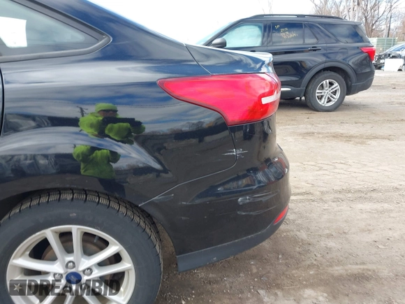2017 Ford Focus SE with VIN 1FADP3F2XHL263071, listed as a IAAI auction lot 42046106 with 91,633 mi miles and . Bid and sale history available at DreamBid. Image 6.