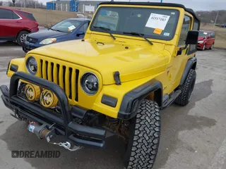 2000 Jeep Wrangler SE with VIN 1J4FA29P2YP797156, listed as a IAAI auction lot 41517183 with 114,236 mi miles. Bid and sale history available at carsss.com. Image 6.