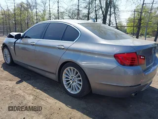 2011 BMW 5 Series 535i xDrive with VIN WBAFU7C5XBC871503, listed as a IAAI auction lot 42107454 with 102,993 mi miles and . Bid and sale history available at carsss.com. Image 3.