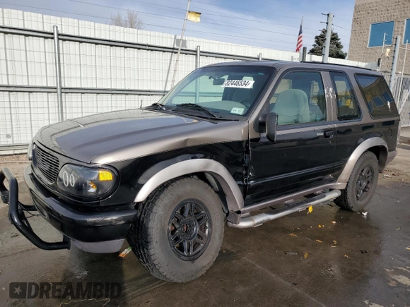1997 Ford Explorer Sport z VIN 1FMDU24E2VUB68077, wystawiony jako Copart lot #82446534 z przebiegiem 196 458 mil mil oraz Szkoda całkowita • Salvage title. Historia ofert i sprzedaży dostępna na DreamBid. Obrazek 1.