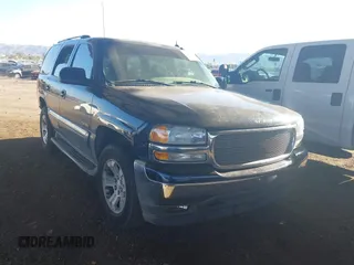 2005 GMC Yukon SLT with VIN 1GKEC13T35J185918, listed as a IAAI auction lot 41025720 with 162,613 mi miles. Bid and sale history available at carsss.com. Image 1.