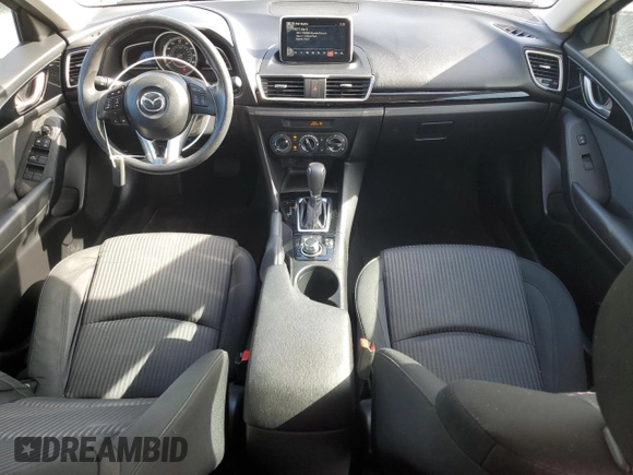 2016 Mazda 3 i Sport with VIN JM1BM1U76G1328540, listed as a Copart auction lot 50189785 with 134,642 mi miles and Salvage Title. Bid and sale history available at DreamBid. Image 8.