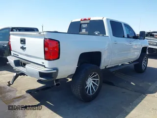 2016 Chevrolet Silverado 1500 LT with VIN 3GCUKREC5GG369915, listed as a IAAI auction lot 42082155 with 137,671 mi miles and . Bid and sale history available at DreamBid. Image 4.