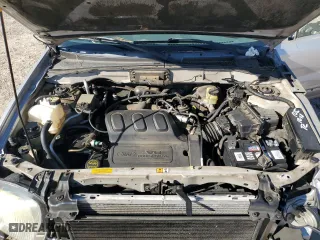 2003 Ford Escape XLT Popular with VIN 1FMYU03163KB45334, listed as a Copart auction lot 86947804 with 121,234 mi miles and Salvage Title. Bid and sale history available at carsss.com. Image 13.