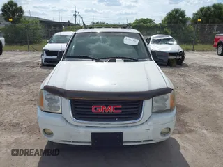 2003 GMC Envoy SLT with VIN 1GKDS13S732379218, listed as a IAAI auction lot 42164368 with Not Provided miles. Bid and sale history available at carsss.com. Image 6.