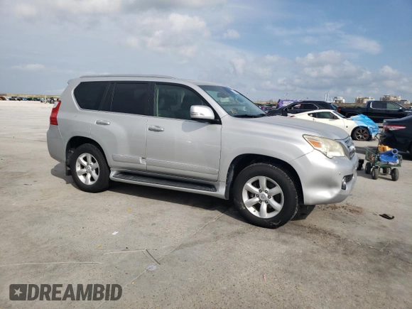 2011 Lexus GX 460 Premium with VIN JTJJM7FX0B5030138, listed as a Copart auction lot 52805215 with 206,275 mi miles and Salvage Title. Bid and sale history available at DreamBid. Image 4.
