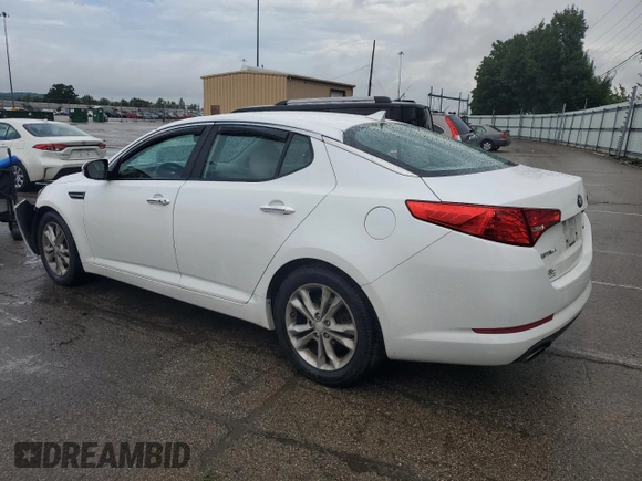 2013 Kia Optima EX with VIN 5XXGN4A7XDG205946, listed as a Copart auction lot 64239325 with 166,178 mi miles and Salvage title. Bid and sale history available at DreamBid. Image 2.