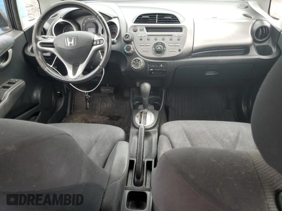 2010 Honda Fit Sport with VIN JHMGE8H48AC002535, listed as a Copart auction lot 60959135 with 136,990 mi miles and Salvage title. Bid and sale history available at DreamBid. Image 8.