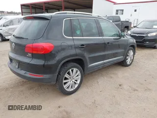 2016 Volkswagen Tiguan S with VIN WVGBV7AX9GW566451, listed as a IAAI auction lot 41393999 with 51,616 mi miles and . Bid and sale history available at DreamBid. Image 4.