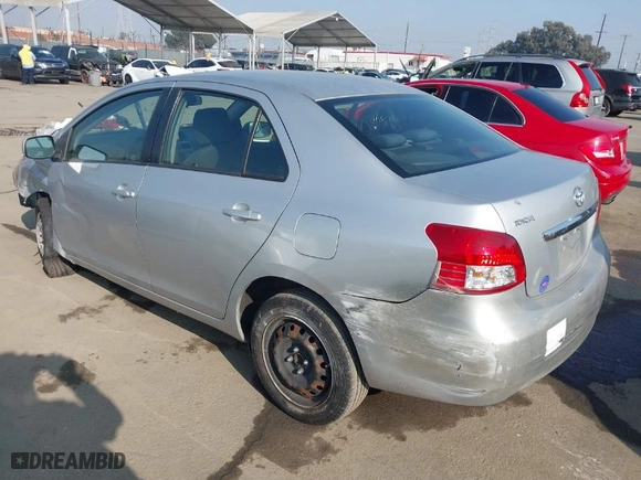 2010 Toyota Yaris with VIN JTDBT4K37A4076727, listed as a IAAI auction lot 41023533 with 102,494 mi miles. Bid and sale history available at carsss.com. Image 3.