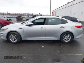 2017 Kia Optima LX with VIN KNAGT4L3XH5162197, listed as a IAAI auction lot 41754002 with 77,141 mi miles. Bid and sale history available at carsss.com. Image 13.