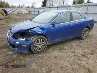 2008 Volkswagen Jetta z VIN 3VWRJ31K68M067231, wystawiony jako Copart lot #53196704 z przebiegiem 161 525 mil mil oraz Szkoda całkowita • Salvage title. Historia ofert i sprzedaży dostępna na DreamBid. Obrazek 1.