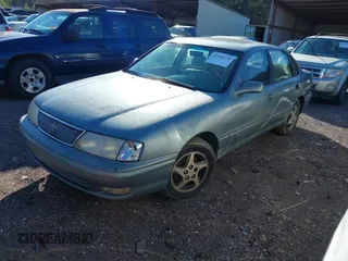 1998 Toyota Avalon XL with VIN 4T1BF18BXWU250149, listed as a IAAI auction lot 41568370 with 299,990 mi miles and . Bid and sale history available at DreamBid. Image 2.