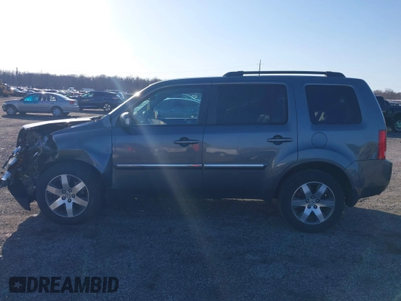 2012 Honda Pilot Touring with VIN 5FNYF3H9XCB042090, listed as a IAAI auction lot 41751359 with 140,424 mi miles and . Bid and sale history available at carsss.com. Image 14.