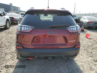 2019 Jeep Cherokee Trailhawk Elite with VIN 1C4PJMBNXKD147403, listed as a Copart auction lot 61609245 with 58,636 mi miles and Clean title. Bid and sale history available at DreamBid. Image 6.