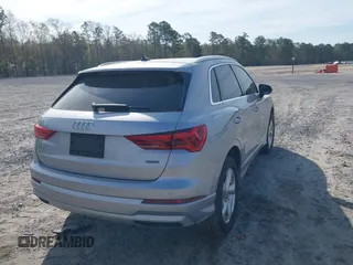 2020 Audi Q3 Premium with VIN WA1AECF36L1057823, listed as a IAAI auction lot 41912118 with 71,004 mi miles and . Bid and sale history available at DreamBid. Image 4.
