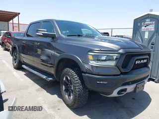 2020 Ram 1500 Rebel with VIN 1C6SRFLT1LN398728, listed as a IAAI auction lot 42526369 with 85,040 mi miles and . Bid and sale history available at DreamBid. Image 1.