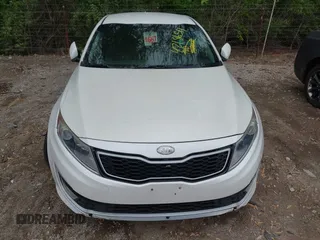 2012 Kia Optima Hybrid with VIN KNAGM4AD6C5014582, listed as a IAAI auction lot 42186511 with 172,517 mi miles. Bid and sale history available at carsss.com. Image 6.