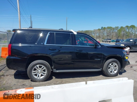 2020 Chevrolet Tahoe LT with VIN 1GNSKBKC3LR176828, listed as a IAAI auction lot 41781047 with 62,840 mi miles and . Bid and sale history available at DreamBid. Image 13.