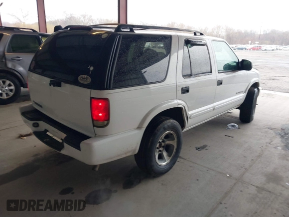 2004 Chevrolet Blazer LS z VIN 1GNDT13X64K129093, wystawiony jako IAAI lot #41860109 z przebiegiem 175 588 mil mil oraz . Historia ofert i sprzedaży dostępna na DreamBid. Obrazek 4.