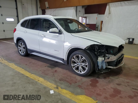 2017 BMW X1 xDrive28i with VIN WBXHT3Z34H4A54811, listed as a Copart auction lot 63584405 with 92,699 mi miles and Salvage title. Bid and sale history available at DreamBid. Image 4.