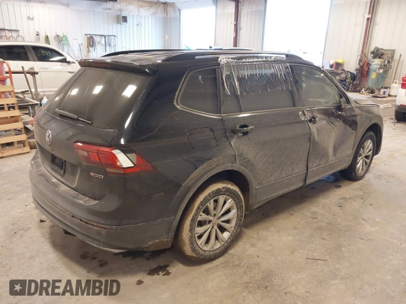 2019 Volkswagen Tiguan S with VIN 3VV0B7AX3KM182311, listed as a IAAI auction lot 41727114 with 98,035 mi miles and . Bid and sale history available at DreamBid. Image 4.