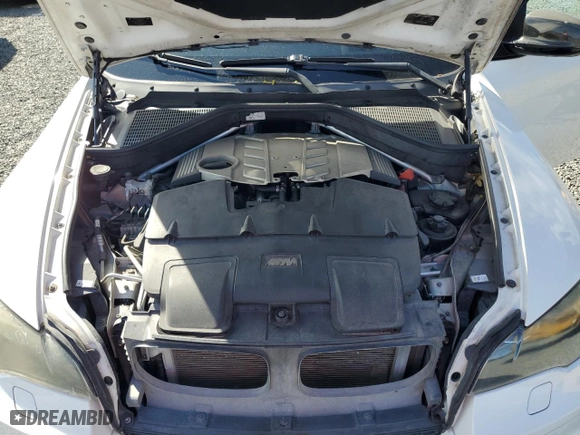 2011 BMW X6 M with VIN 5YMGZ0C55BLK13899, listed as a Copart auction lot 77141774 with 93,316 mi miles and Salvage Title. Bid and sale history available at carsss.com. Image 12.