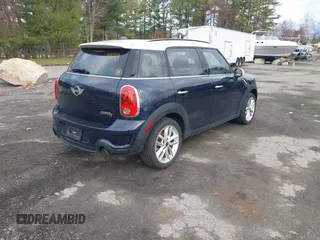 2013 MINI Countryman S z VIN WMWZC3C57DWP22864, wystawiony jako IAAI lot #42041909 z przebiegiem 139 932 mil mil oraz . Historia ofert i sprzedaży dostępna na DreamBid. Obrazek 4.