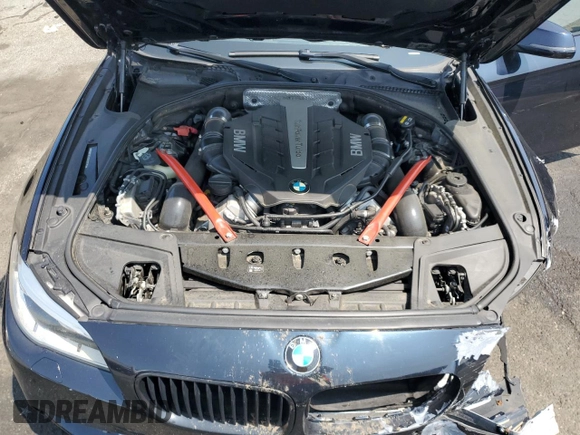2016 BMW 5 Series 550i xDrive with VIN WBAKP9C52GG587591, listed as a Copart auction lot 58402505 with 94,384 mi miles and Salvage title. Bid and sale history available at DreamBid. Image 11.