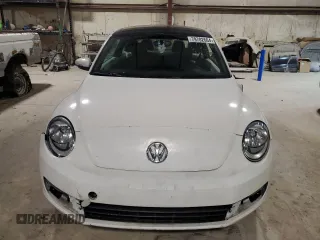 2012 Volkswagen Beetle 2.5L PZEV with VIN 3VWJP7AT3CM610930, listed as a Copart auction lot 79702664 with 0 mi miles and Salvage Title. Bid and sale history available at carsss.com. Image 5.