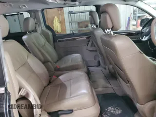 2012 Volkswagen Routan z VIN 2C4RVADG0CR355752, wystawiony jako Copart lot #53687155 z przebiegiem 132 903 mil mil oraz Szkoda całkowita • Salvage title. Historia ofert i sprzedaży dostępna na DreamBid. Obrazek 11.