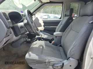 2001 Nissan Frontier XE z VIN 1N6DD26S71C315501, wystawiony jako Copart lot #55604945 z przebiegiem 202 275 mil mil oraz Szkoda całkowita • Salvage title. Historia ofert i sprzedaży dostępna na DreamBid. Obrazek 7.