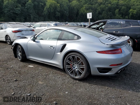 2015 Porsche 911 Turbo S with VIN WP0AD2A97FS166370, listed as a Copart auction lot 68497274 with 3,015 mi miles and Salvage Title. Bid and sale history available at DreamBid. Image 2.