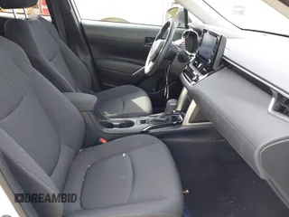 2022 Toyota Corolla Cross LE with VIN 7MUBAAAG6NV021369, listed as a IAAI auction lot 42282685 with 37,863 mi miles and . Bid and sale history available at DreamBid. Image 5.
