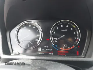 2021 BMW X1 xDrive28i z VIN WBXJG9C09M5T94206, wystawiony jako IAAI lot #42498235 z przebiegiem 62 079 mil mil oraz . Historia ofert i sprzedaży dostępna na DreamBid. Obrazek 7.
