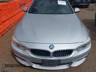 2015 BMW 4 Series 428i xDrive with VIN WBA4C9C50FD330482, listed as a IAAI auction lot 42116547 with 192,739 mi miles and . Bid and sale history available at DreamBid. Image 6.